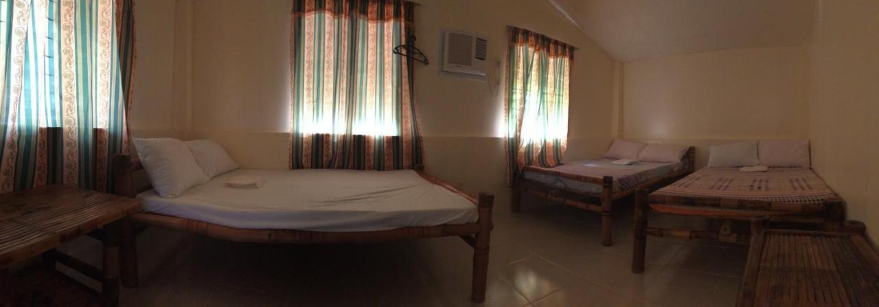 Se San Beach Resort-Isla De Gigantes Carles Екстер'єр фото