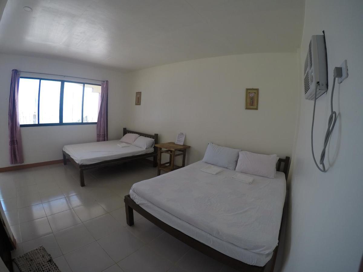 Se San Beach Resort-Isla De Gigantes Carles Екстер'єр фото
